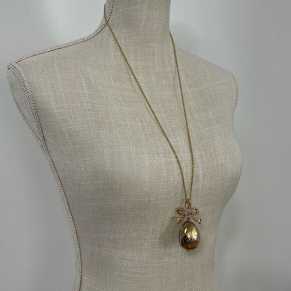 Avon Jewelry - Vintage Avon Egg Locket Far Way Solid Perfume Gold Toned Necklace